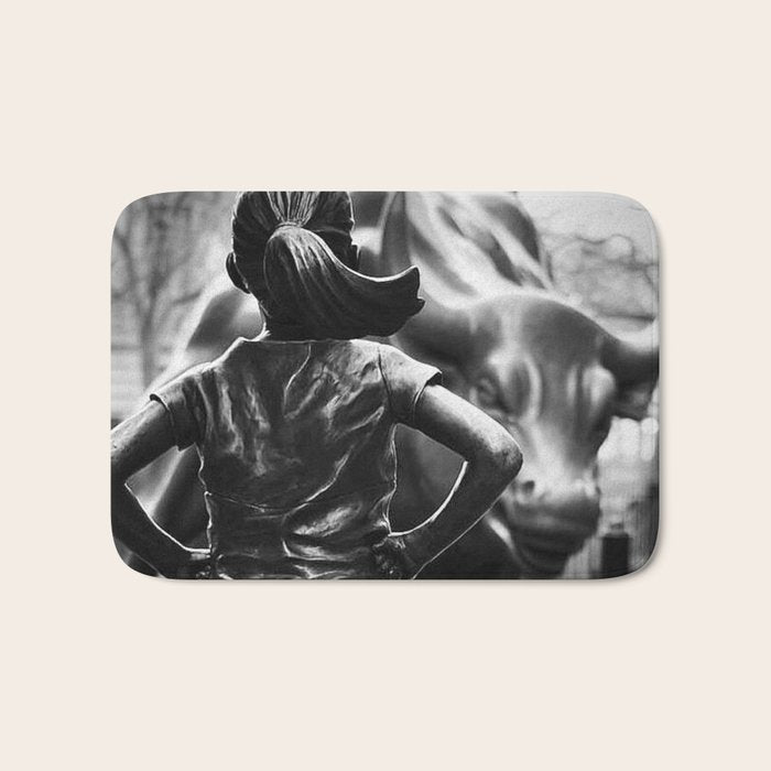 Fearless Girl facing down the Charging Bull statue of Wall Street black and white photography Bath Mat Gallery Image 1
