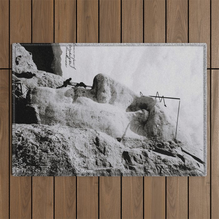Workmen on face of George Washington, Mount Rushmore, South Dakota black and white photograph Outdoor Rug Gallery Image 1