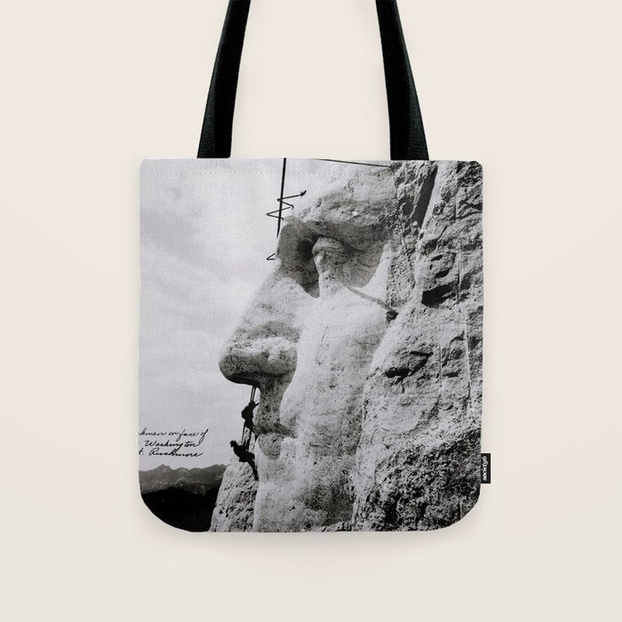 Workmen on face of George Washington, Mount Rushmore, South Dakota black and white photograph Tote Bag Gallery Image 1