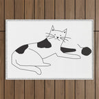 Black and white cat with yarn Outdoor Rug Gallery Image 1