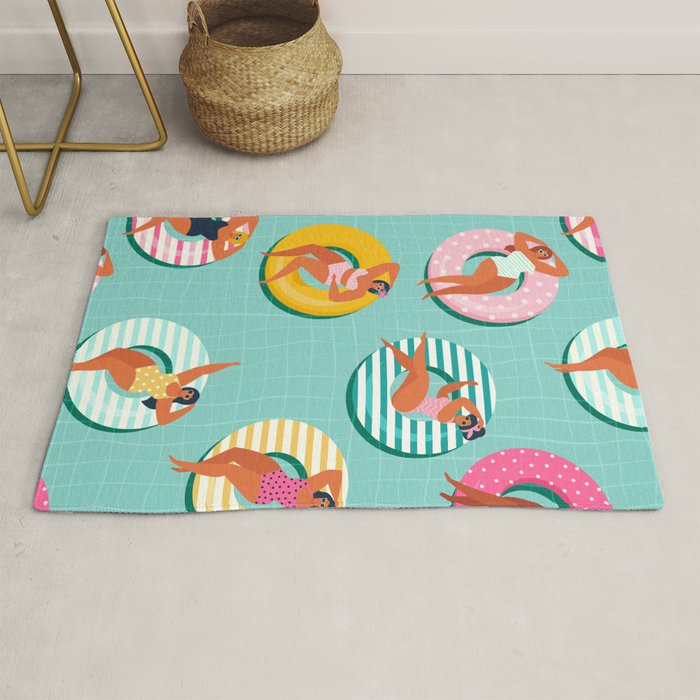 Summer gils on inflatable in swimming pool floats. Rug Gallery Image 1