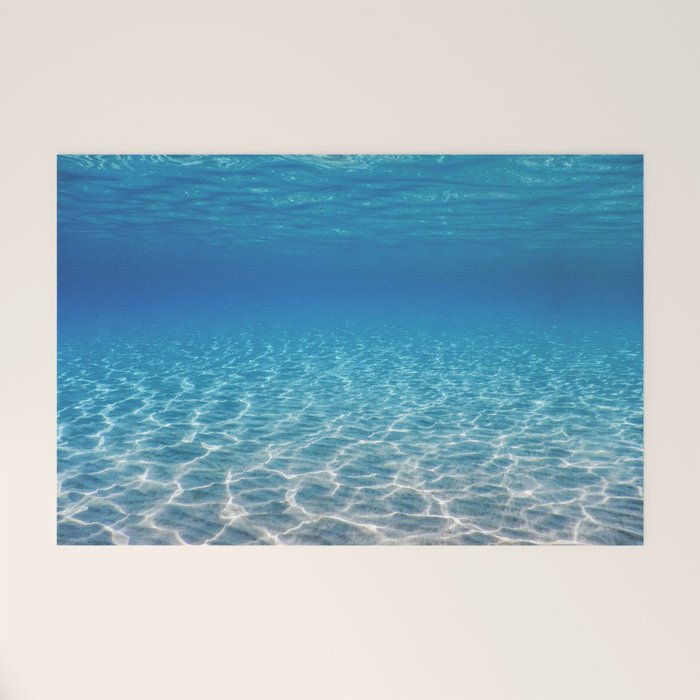 Underwater Blue Ocean, Sandy sea bottom Underwater background Welcome Mat Gallery Image 1