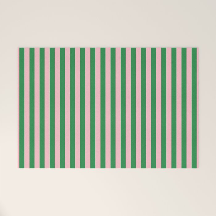 Narrow Stripes Vertical Pattern in Kelly Green and Blush Pink Welcome Mat Gallery Image 1