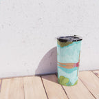 Floating in the sea in bright colours Travel Mug Gallery Image 4