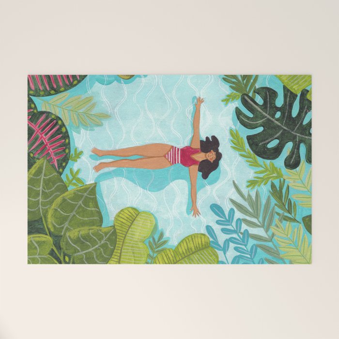Floating in the sea in bright colours Welcome Mat Gallery Image 1