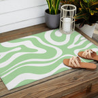Modern Retro Liquid Swirl Abstract Pattern in Light Matcha Tea Green and White Outdoor Rug Gallery Image 2