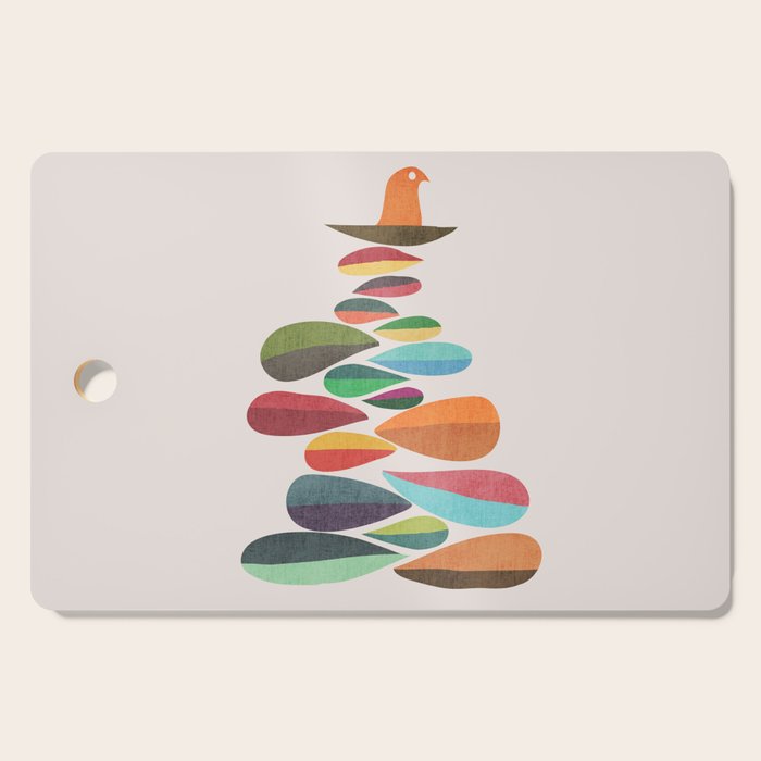 Bird nesting on top of pebbles hill Cutting Board Gallery Image 1