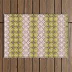 Nuanced echoing circles tell a story in a painterly way with soft muted hues Outdoor Rug Gallery Image 1