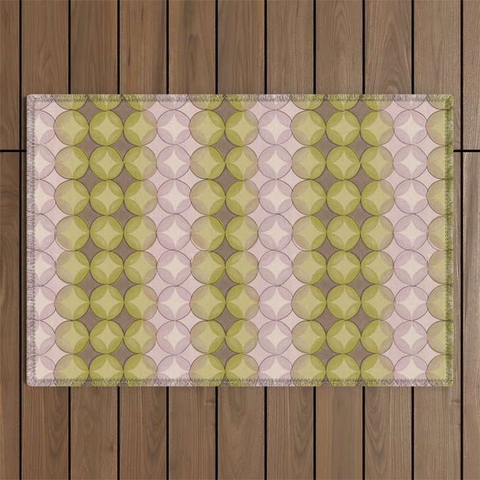 Nuanced echoing circles tell a story in a painterly way with soft muted hues Outdoor Rug Gallery Image 1