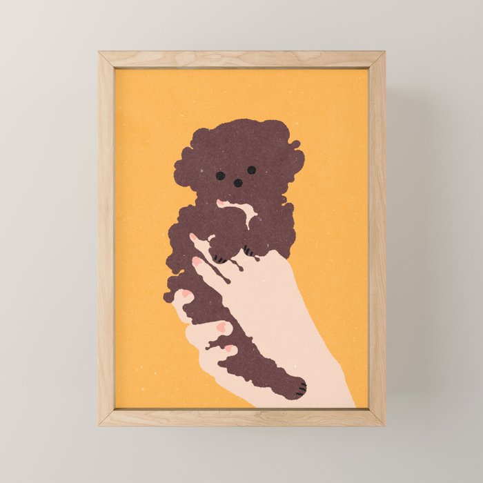 Cute puppy in arms Mini Art Print Gallery Image 1