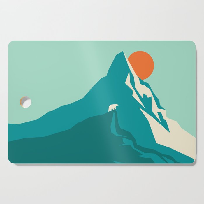 As the sun rises over the peak Cutting Board Gallery Image 1