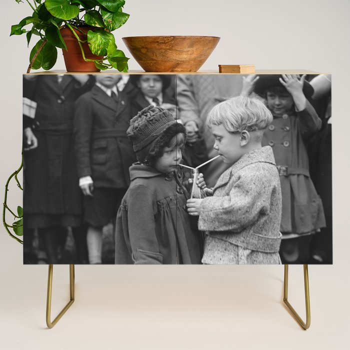 Sweet little boy and girl sharing a drink vintage funny humorous black and white photograph Credenza Gallery Image 1