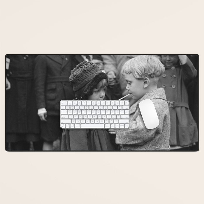 Sweet little boy and girl sharing a drink vintage funny humorous black and white photograph Desk Mat Gallery Image 1