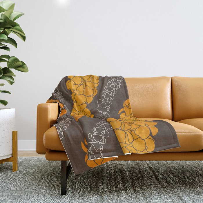 Hawaiian Puakenikeni lei on brown Throw Blanket Gallery Image 1