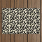 Folk Art Bunnies - black and cream Outdoor Rug Gallery Image 1