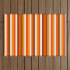 Vertical Fine Stripes in Retro 70s Orange and Brown Outdoor Rug Gallery Image 1