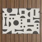 Playful Bauhaus geometric black shapes Outdoor Rug Gallery Image 1