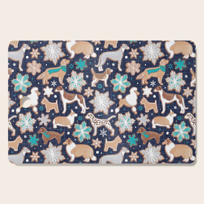Catching ice and sweetness // navy blue background gingerbread white brown grey and dogs and snowflakes turquoise details Cutting Board Gallery Image 1
