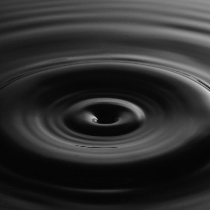 Zen water droplet in pool of water black and white inspirational photograph art print Coffee Mug Gallery Image 2
