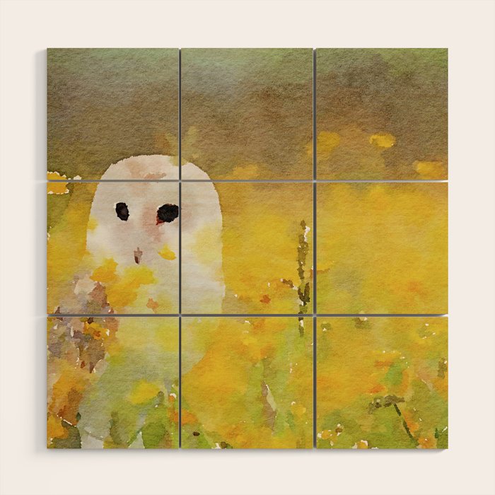 snowy owl in field Wood Wall Art Gallery Image 1