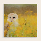 snowy owl in field Wood Wall Art Gallery Image 1