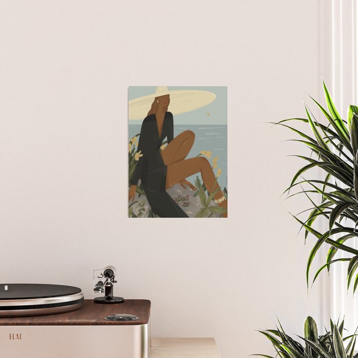 a woman in a black dress on the seashore Poster Gallery Image 2