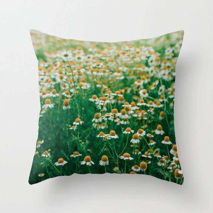 Little White Flowers in a Garden Throw Pillow Gallery Image 1