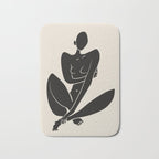 Sitting nude in black Bath Mat Gallery Image 1