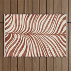Dark Terracotta Abstract Leaf Artwork Outdoor Rug Gallery Image 1