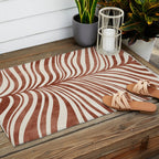 Dark Terracotta Abstract Leaf Artwork Outdoor Rug Gallery Image 2