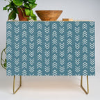 Muted teal and soft white ink brushed arrow heads pattern with textured background Credenza Gallery Image 1