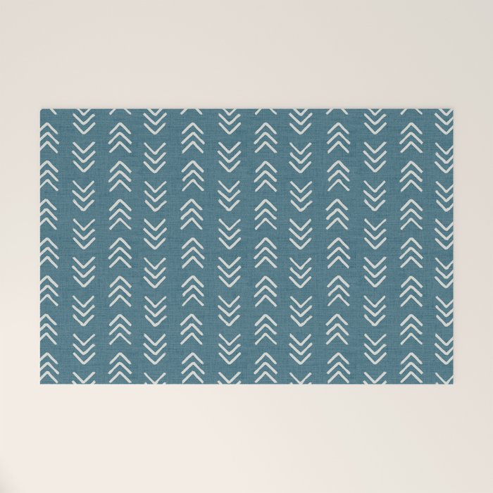 Muted teal and soft white ink brushed arrow heads pattern with textured background Welcome Mat Gallery Image 1