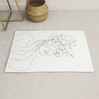 Minimal Line Art Woman with Magnolia Rug Gallery Image 1