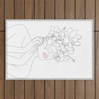 Minimal Line Art Woman with Magnolia Outdoor Rug Gallery Image 1