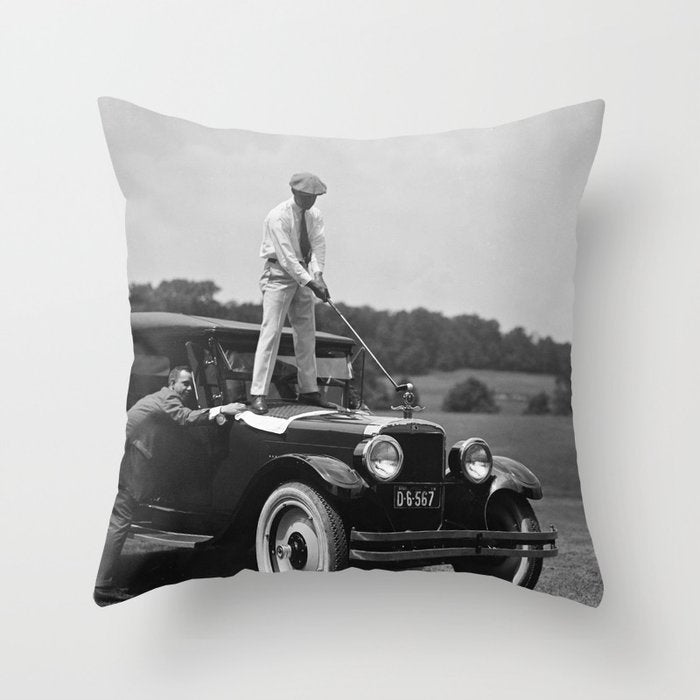 Pro golfer hitting golf ball off vintage car hood ornament on a dare par one 18th hole funny black and white golf sport photograph - photography - photographs Throw Pillow Gallery Image 6