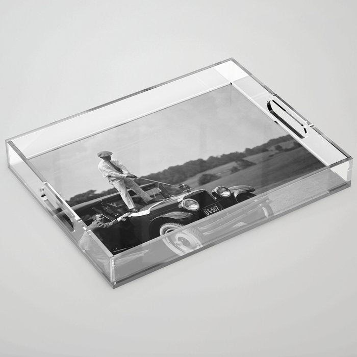 Pro golfer hitting golf ball off vintage car hood ornament on a dare par one 18th hole funny black and white golf sport photograph - photography - photographs Acrylic Tray Gallery Image 1