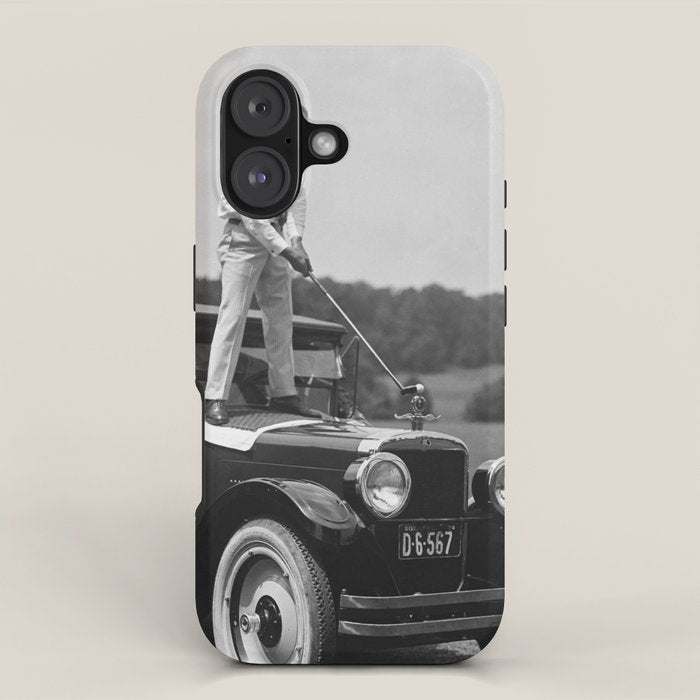 Pro golfer hitting golf ball off vintage car hood ornament on a dare par one 18th hole funny black and white golf sport photograph - photography - photographs iPhone Case Gallery Image 1