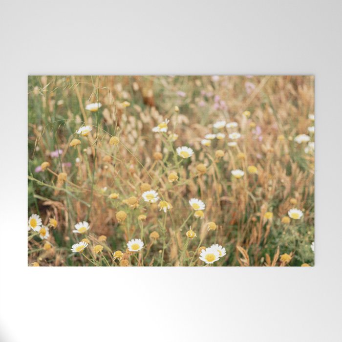 Wildflowers on the coast in Ericeira | Portugal travel photography Welcome Mat Gallery Image 1
