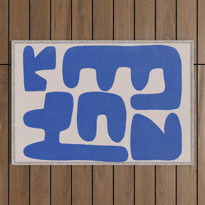 Irregular shape arrangement in blue Outdoor Rug Gallery Image 1