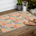 Block print leaves pattern peachy Outdoor Rug Gallery Image 2