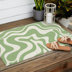 Retro Liquid Swirl Abstract Pattern in Light Sage Green and Cream Outdoor Rug Gallery Image 2