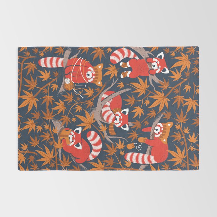Red panda blending with the foliage // navy background red cozy animals fog brown taupe tree branches orange acer leaves Rug Gallery Image 2