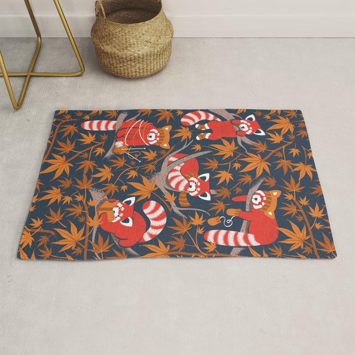 Red panda blending with the foliage // navy background red cozy animals fog brown taupe tree branches orange acer leaves Rug Gallery Image 1