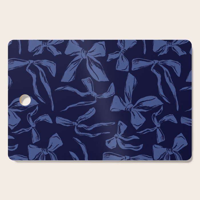 Blue bow pattern with dark background Cutting Board Gallery Image 1