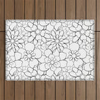 Black and white hand drawn flower art pattern Outdoor Rug Gallery Image 1