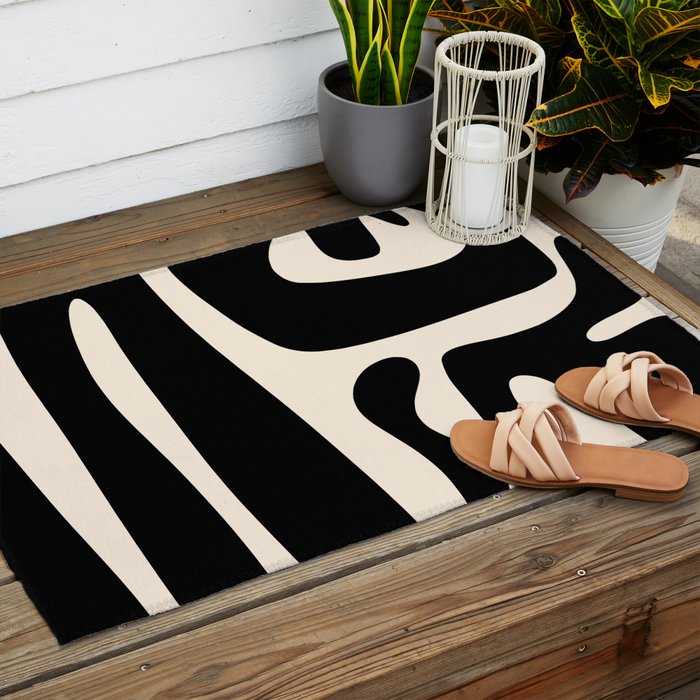 Mid Century Modern Kwaito Abstract Pattern in Black and Almond Cream Outdoor Rug Gallery Image 2