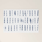 Blue indigo stripes over white shibori tie dye pattern Welcome Mat Gallery Image 1