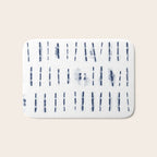 Blue indigo stripes over white shibori tie dye pattern Bath Mat Gallery Image 1