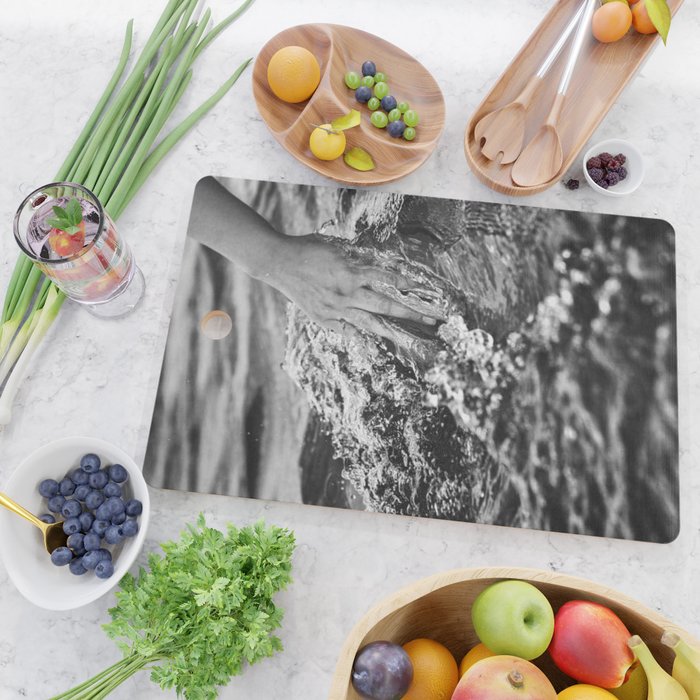 Running hand through the water, under the blue again black and white photograph / art photography Cutting Board Gallery Image 2