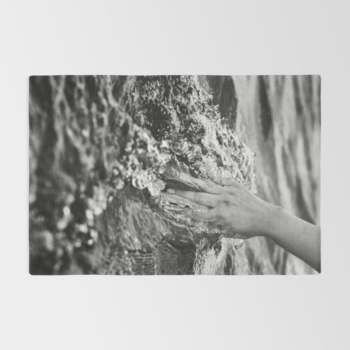 Running hand through the water, under the blue again black and white photograph / art photography Rug Gallery Image 2
